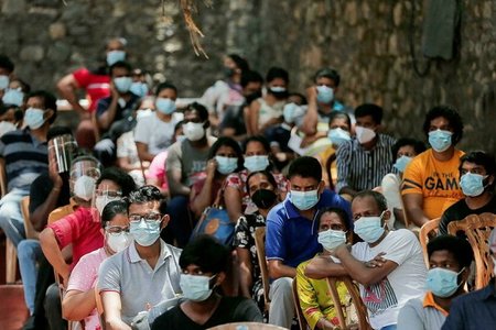 Covid-19: GDP thế giới có thể mất 2.300 tỉ đô la do tiêm chủng chậm